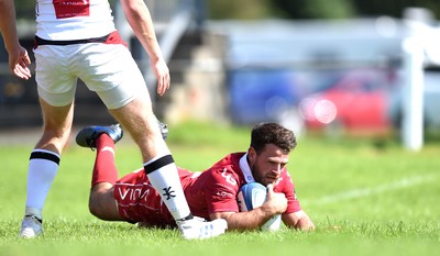 240819 - Scarlets A v Ulster A - Celtic Cup - Rhodri Jones of Scarlets A runs in to score try