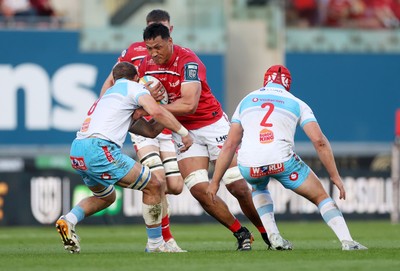 250426 - Scarlets v Vodacom Bulls - United Rugby Championship - Sam Lousi of Scarlets is tackled by Cameron Hanekom of Bulls 