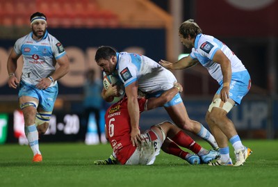 250426 - Scarlets v Vodacom Bulls - United Rugby Championship - Francois Kloppers of Bulls is tackled by Taine Plumtree of Scarlets 