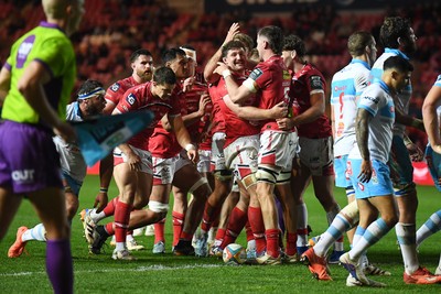 250426 - Scarlets v Vodacom Bulls - United Rugby Championship - Fletcher Anderson of Scarlets celebrates scoring a try with team mates