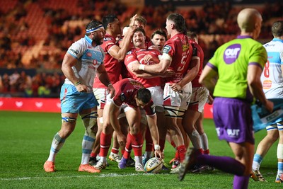 250426 - Scarlets v Vodacom Bulls - United Rugby Championship - Fletcher Anderson of Scarlets celebrates scoring a try with team mates
