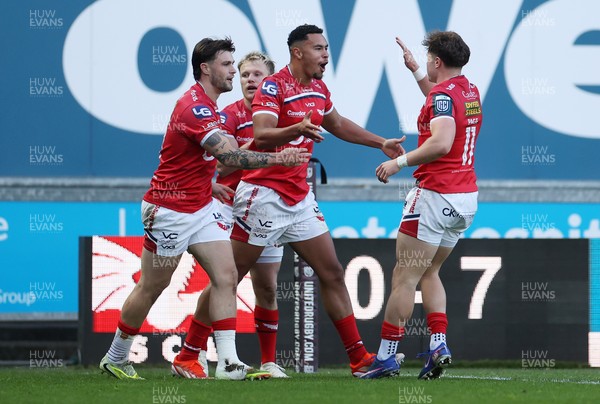 250426 - Scarlets v Vodacom Bulls - United Rugby Championship - Callum Woolley of Scarlets celebrates scoring a try