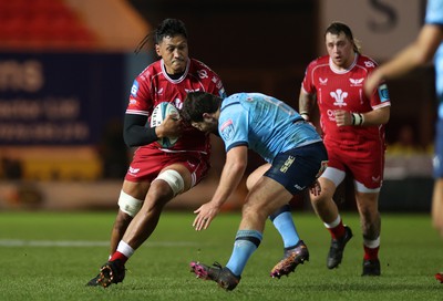 270123 - Scarlets v Vodacom Bulls - United Rugby Championship - Sam Lousi of Scarlets is tackled by Marco van Staden of Bulls