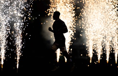 270123 - Scarlets v Vodacom Bulls - United Rugby Championship - Dan Davis of Scarlets runs through the fireworks onto the field