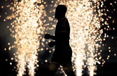 270123 - Scarlets v Vodacom Bulls - United Rugby Championship - Ryan Conbeer of Scarlets runs through the fireworks onto the field