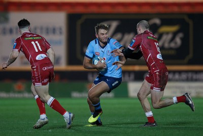 270123 - Scarlets v Vodacom Bulls - United Rugby Championship - David Kriel of Blue Bulls is tackled by Ioan Nicholas of Scarlets