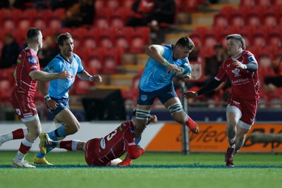 270123 - Scarlets v Vodacom Bulls - United Rugby Championship - Elrigh Louw of Blue Bulls is tackled by Joe Roberts of Scarlets