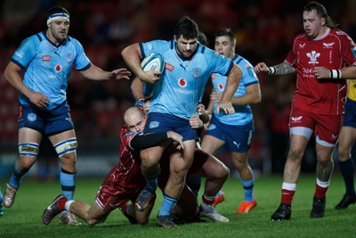 270123 - Scarlets v Vodacom Bulls - United Rugby Championship - Marco van Staden of Blue Bulls is tackled by Ioan Nicholas of Scarlets