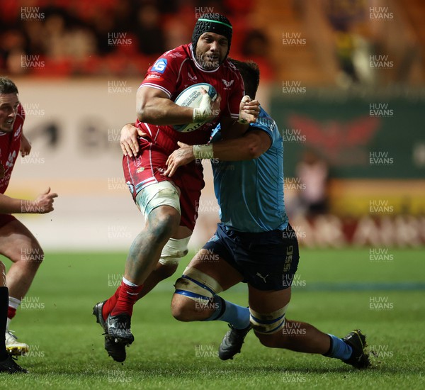 270123 - Scarlets v Vodacom Bulls - United Rugby Championship - Sione Kalamafoni of Scarlets is tackled by Ruan Vermaak of Bulls
