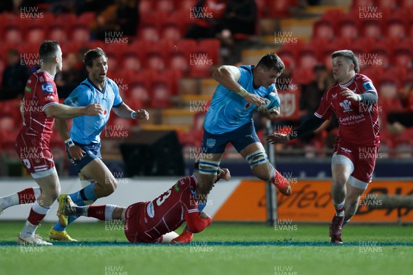 270123 - Scarlets v Vodacom Bulls - United Rugby Championship - Elrigh Louw of Blue Bulls is tackled by Joe Roberts of Scarlets