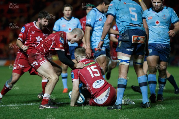 270123 - Scarlets v Vodacom Bulls - United Rugby Championship - Ioan Nicholas and Dan Jones of Scarlets celebrate as Johnny McNicholl scores a try