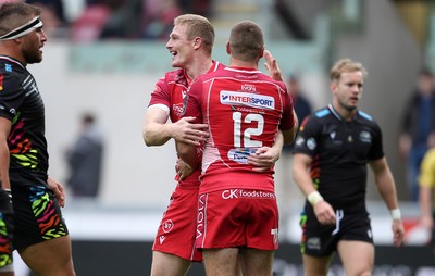 121019 - Scarlets v Zebre Rugby - Guinness PRO14 - Johnny McNicholl of Scarlets celebrates scoring a try