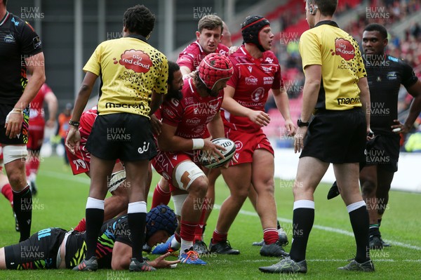121019 - Scarlets v Zebre Rugby - Guinness PRO14 - Josh Macleod of Scarlets celebrates scoring a try with team mates