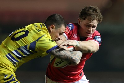 200326 - Scarlets v Zebre Parma - United Rugby Championship - Macs Page of Scarlets is tackled by Giacomo Da Re of Zebre 