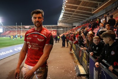 200326 - Scarlets v Zebre Parma - United Rugby Championship - Johnny Williams of Scarlets with fans