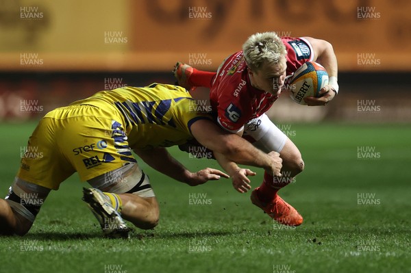 200326 - Scarlets v Zebre Parma - United Rugby Championship - Blair Murray of Scarlets is tackled by Matteo Canali of Zebre 