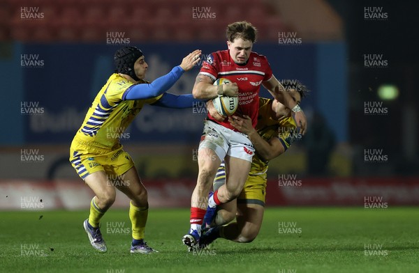 200326 - Scarlets v Zebre Parma - United Rugby Championship - Macs Page of Scarlets is tackled by Marco Zanon of Zebre 