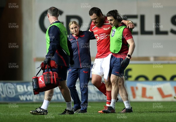200326 - Scarlets v Zebre Parma - United Rugby Championship - Marnus van der Merwe of Scarlets leaves the field injured