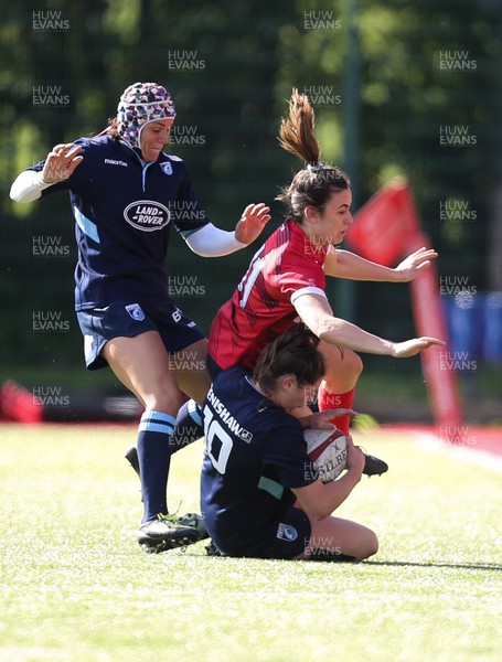 230918 - Scarlets Women v Cardiff Blues Women - Brittony Price of Scarlets and Robyn Wilkins of Blues compete to win the ball