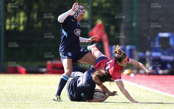 230918 - Scarlets Women v Cardiff Blues Women - Brittony Price of Scarlets and Robyn Wilkins of Blues compete to win the ball