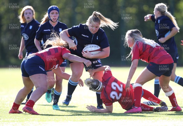 230918 - Scarlets Women v Cardiff Blues Women - Lilly Snape of Blues takes on the Scarlets line