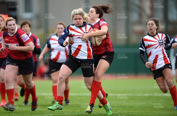 060316 - Scarlets Women v Ospreys Women -Natalie Watlins of Ospreys is tackled by Jodie Evans