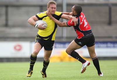 11.07.10.. South Wales Scorpions v Gateshead Thunder, The Co-operative Championship Div 1 -  Scorpions Christiaan Roets takes on Gateshead's Michael Brown  