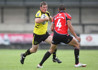 11.07.10.. South Wales Scorpions v Gateshead Thunder, The Co-operative Championship Div 1 -  Scorpions Neil Dallimore takes on Gateshead's Michael Brown  