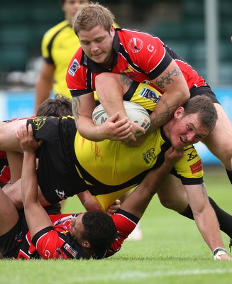 11.07.10.. South Wales Scorpions v Gateshead Thunder, The Co-operative Championship Div 1 -  Scorpions Neil Dallimore is held short of the line 