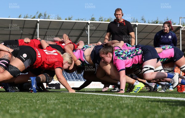 200923 - Scotland Women and Wales Women Combined Training Session - Ioan Cunningham looks on as the Welsh and Scottish packs scrummage against each other during a combined training session in Edinburgh