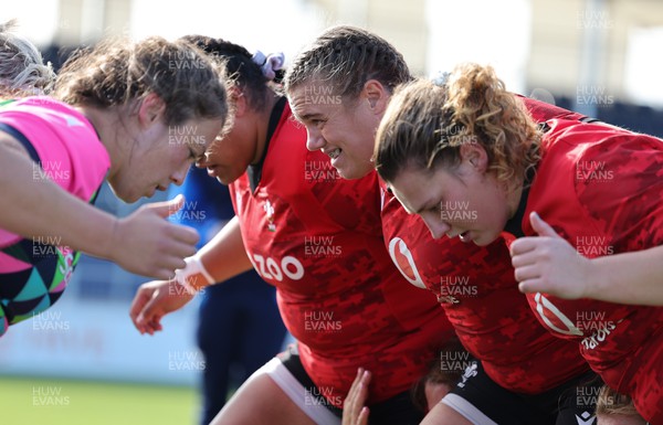 200923 - Scotland Women and Wales Women Combined Training Session - Sisilia Tuipulotu, Carys Phillips and Gwenllian Pyrs prepare to scrummage against the Scottish pack during a combined training session in Edinburgh