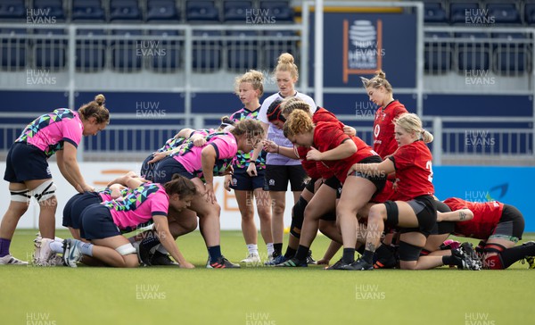 200923 - Scotland Women and Wales Women Combined Training Session - The Wales and Scotland team prepare to scrummage during a combined training session in Edinburgh