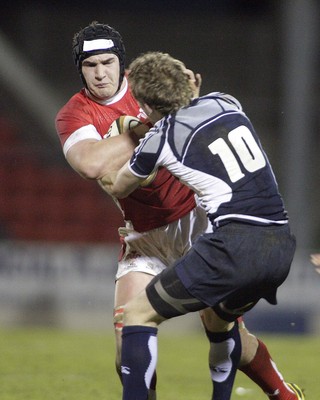 06.02.09 - Scotland U20 v Wales U20... Andrew White of Scotland tackles James Thomas of Wales 