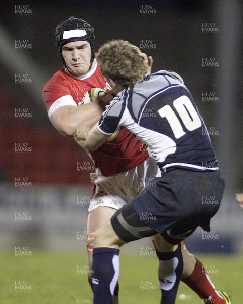 06.02.09 - Scotland U20 v Wales U20... Andrew White of Scotland tackles James Thomas of Wales 