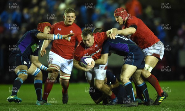 080319 - Scotland Under 20 v Wales Under 20 - U20s 6 Nations Championship - Dewi Lake of Wales is tackled by Charlie Jupp and Robbie McCallum of Scotland