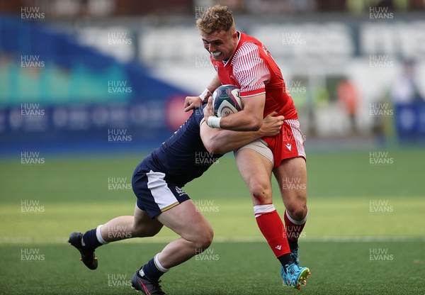 130721 - Wales U20s v Scotland U20s - Morgan Richards of Wales is tackled by Finlay Callaghan of Scotland