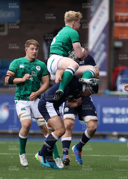 190621 - Scotland U20s v Ireland U20s - U20s 6 Nations Championship - Jamie Osborne of Ireland crashes over Harri Morris of Scotland who is given a red card for the offence