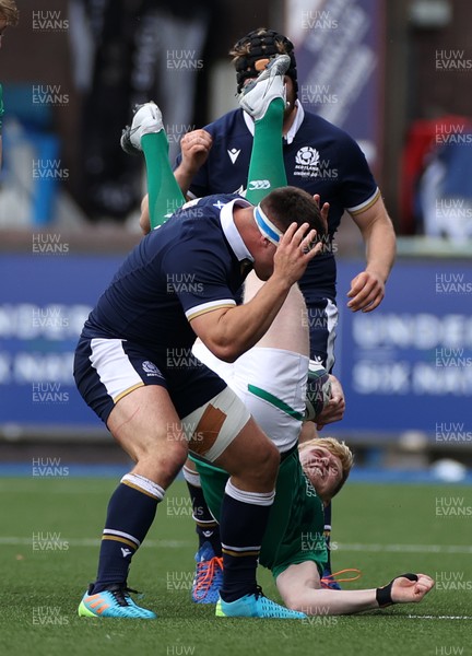 190621 - Scotland U20s v Ireland U20s - U20s 6 Nations Championship - Jamie Osborne of Ireland crashes over Harri Morris of Scotland who is given a red card for the offence