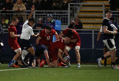 070325 - Scotland U20s v Wales U20s - U20s 6 Nations Championship - Ioan Emanuel of Wales celebrates scoring a try with team mates