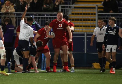 070325 - Scotland U20s v Wales U20s - U20s 6 Nations Championship - Ioan Emanuel of Wales celebrates scoring a try with team mates