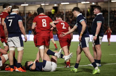 070325 - Scotland U20s v Wales U20s - U20s 6 Nations Championship - Harry Thomas of Wales celebrates scoring a try with team mates