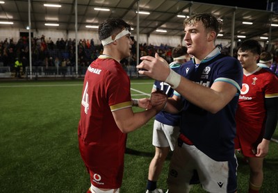 070325 - Scotland U20s v Wales U20s - U20s 6 Nations Championship - Kenzie Jenkins of Wales shakes hands with opposition team at full time