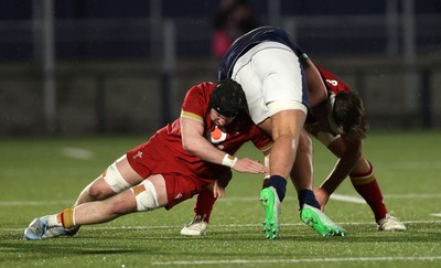 070325 - Scotland U20s v Wales U20s - U20s 6 Nations Championship - Evan Minto of Wales and Kenzie Jenkins of Wales make the tackle