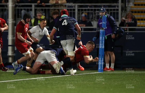 070325 - Scotland U20s v Wales U20s - U20s 6 Nations Championship - Ioan Emanuel of Wales scores a try