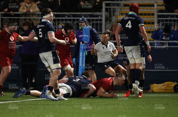 070325 - Scotland U20s v Wales U20s - U20s 6 Nations Championship - Ioan Emanuel of Wales scores a try