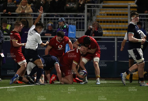 070325 - Scotland U20s v Wales U20s - U20s 6 Nations Championship - Ioan Emanuel of Wales celebrates scoring a try with team mates