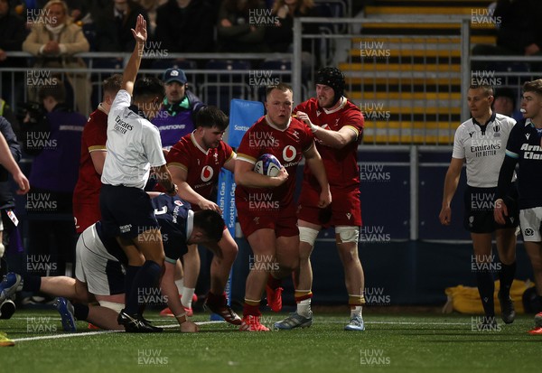 070325 - Scotland U20s v Wales U20s - U20s 6 Nations Championship - Ioan Emanuel of Wales celebrates scoring a try with team mates