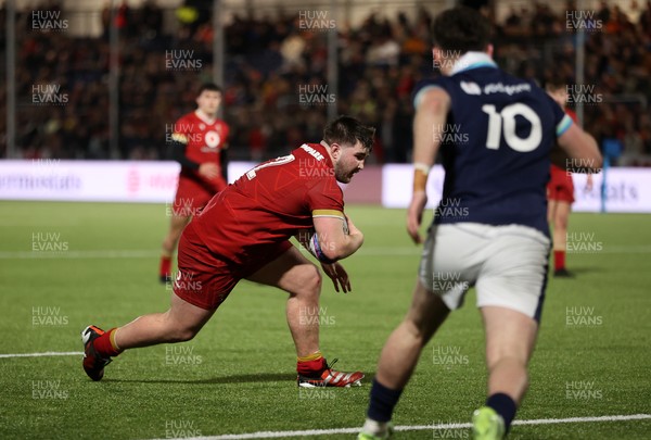 070325 - Scotland U20s v Wales U20s - U20s 6 Nations Championship - Harry Thomas of Wales dives over the line to score a try