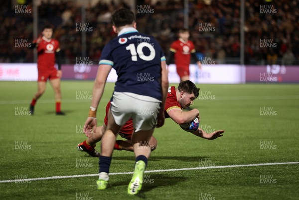 070325 - Scotland U20s v Wales U20s - U20s 6 Nations Championship - Harry Thomas of Wales dives over the line to score a try