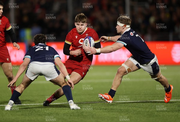 070325 - Scotland U20s v Wales U20s - U20s 6 Nations Championship - Steff Emanuel of Wales is tackled by Freddy Douglas of Scotland 